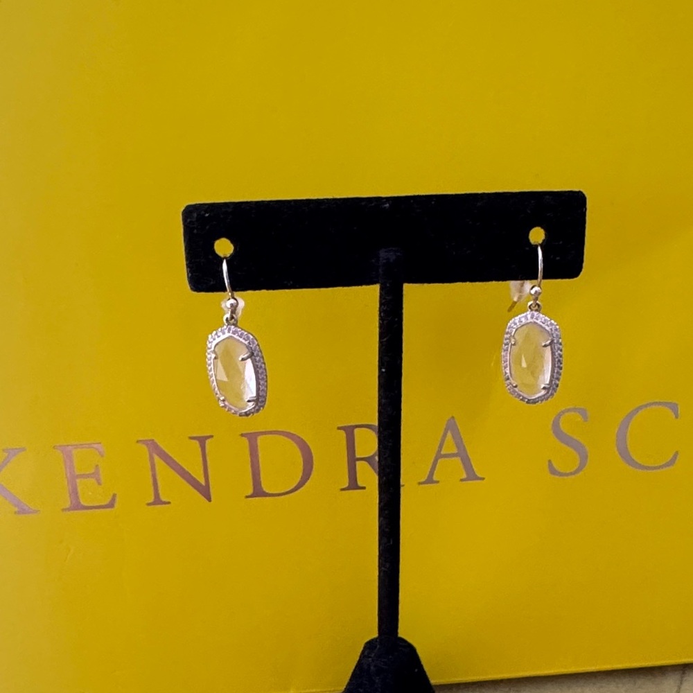 Kendra Scott Silver and Gold Earrings new without tags